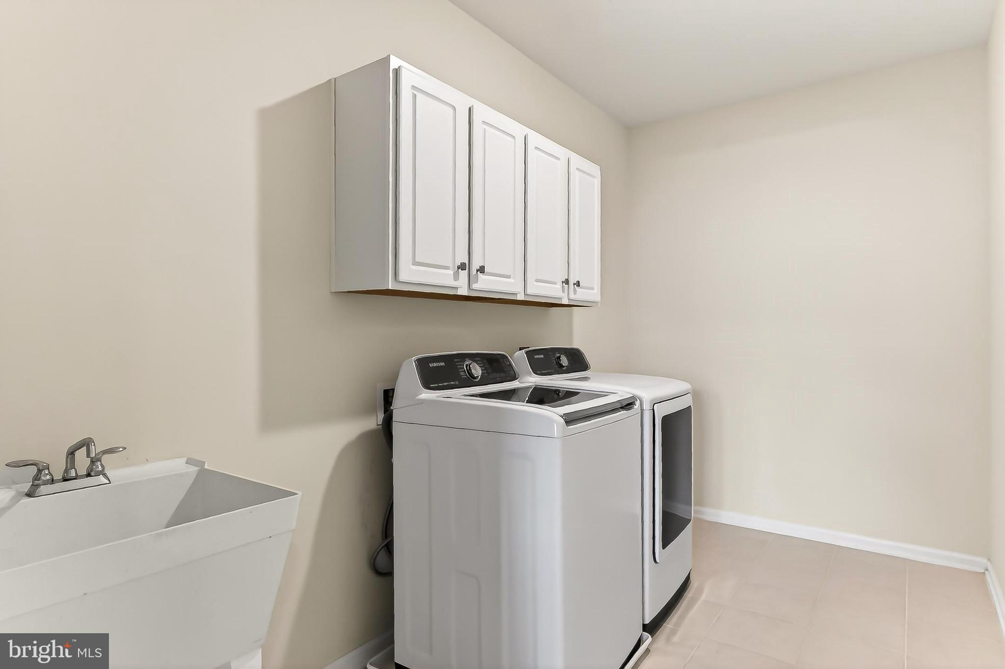 1103 Themis Street Southeast Leesburg, VA 20175 - Photo 72 of 108 a utility room with dryer and washer