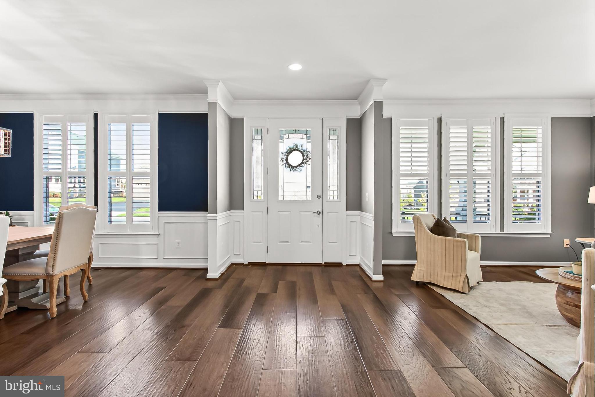 1103 Themis Street Southeast Leesburg, VA 20175 - Photo 8 of 108 Inviting entryway with elegant hardwood floors.