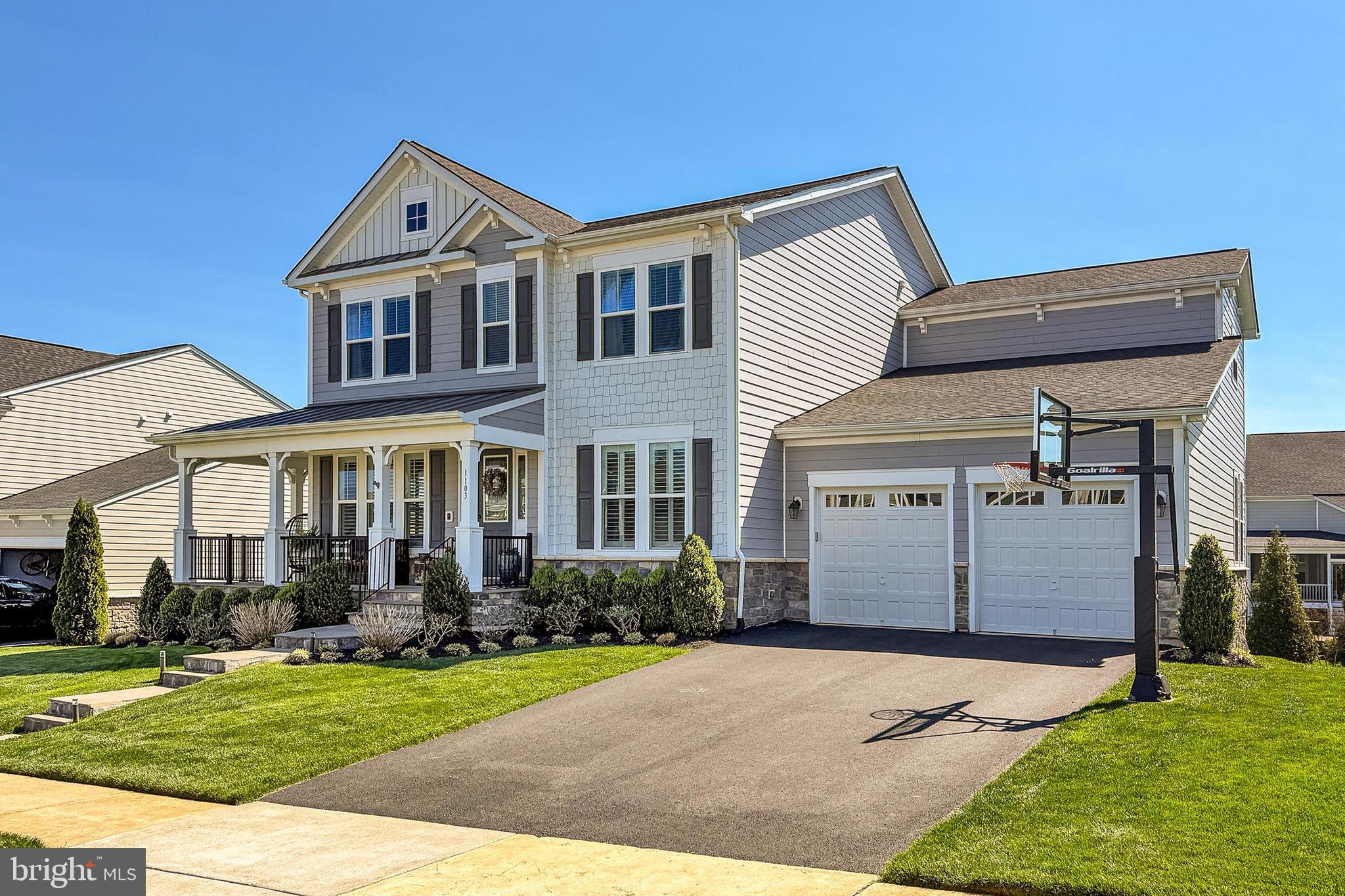 1103 Themis Street Southeast Leesburg, VA 20175 - Photo 81 of 108 a front view of a house with a yard