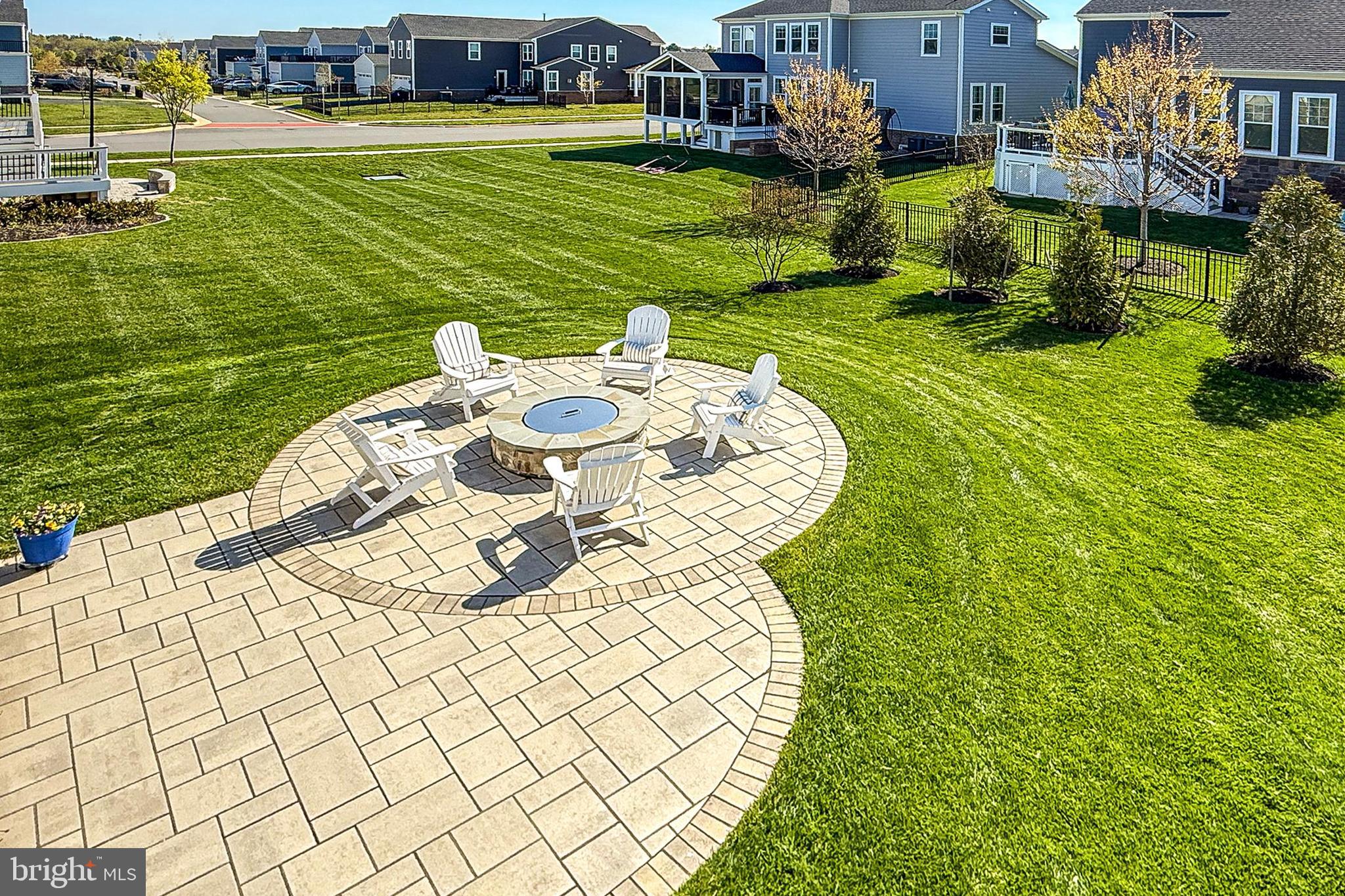 1103 Themis Street Southeast Leesburg, VA 20175 - Photo 85 of 108 a view of a lake with a house swimming pool and outdoor space