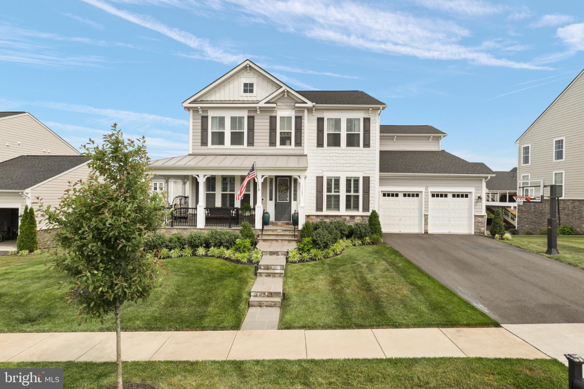 1103 Themis Street Southeast Leesburg, VA 20175 - Photo 98 of 108 a front view of a house with a yard