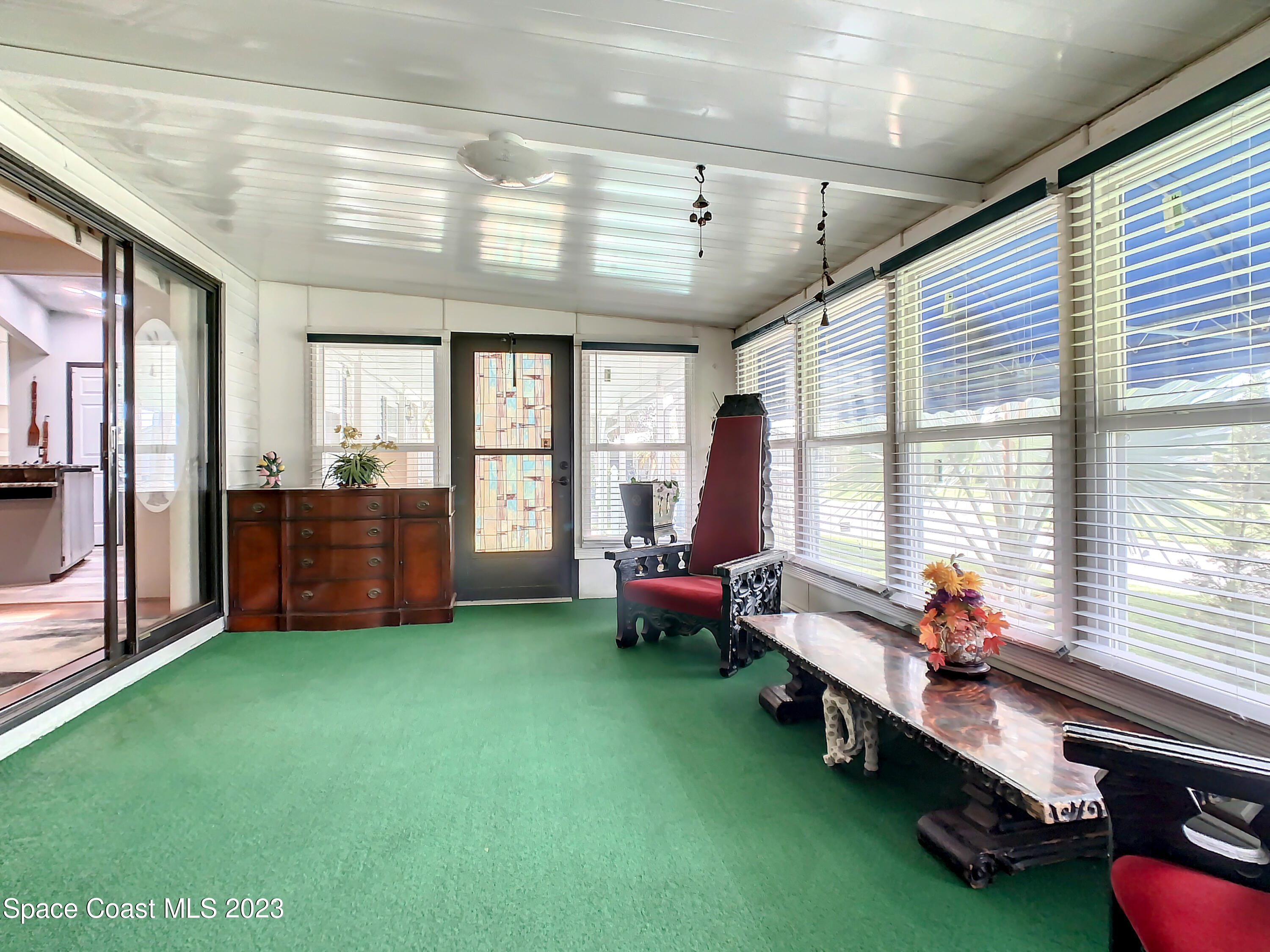 832 Periwinkle Circle Sebastian, FL 32976 - Photo 36 of 52 a room with pool table and windows