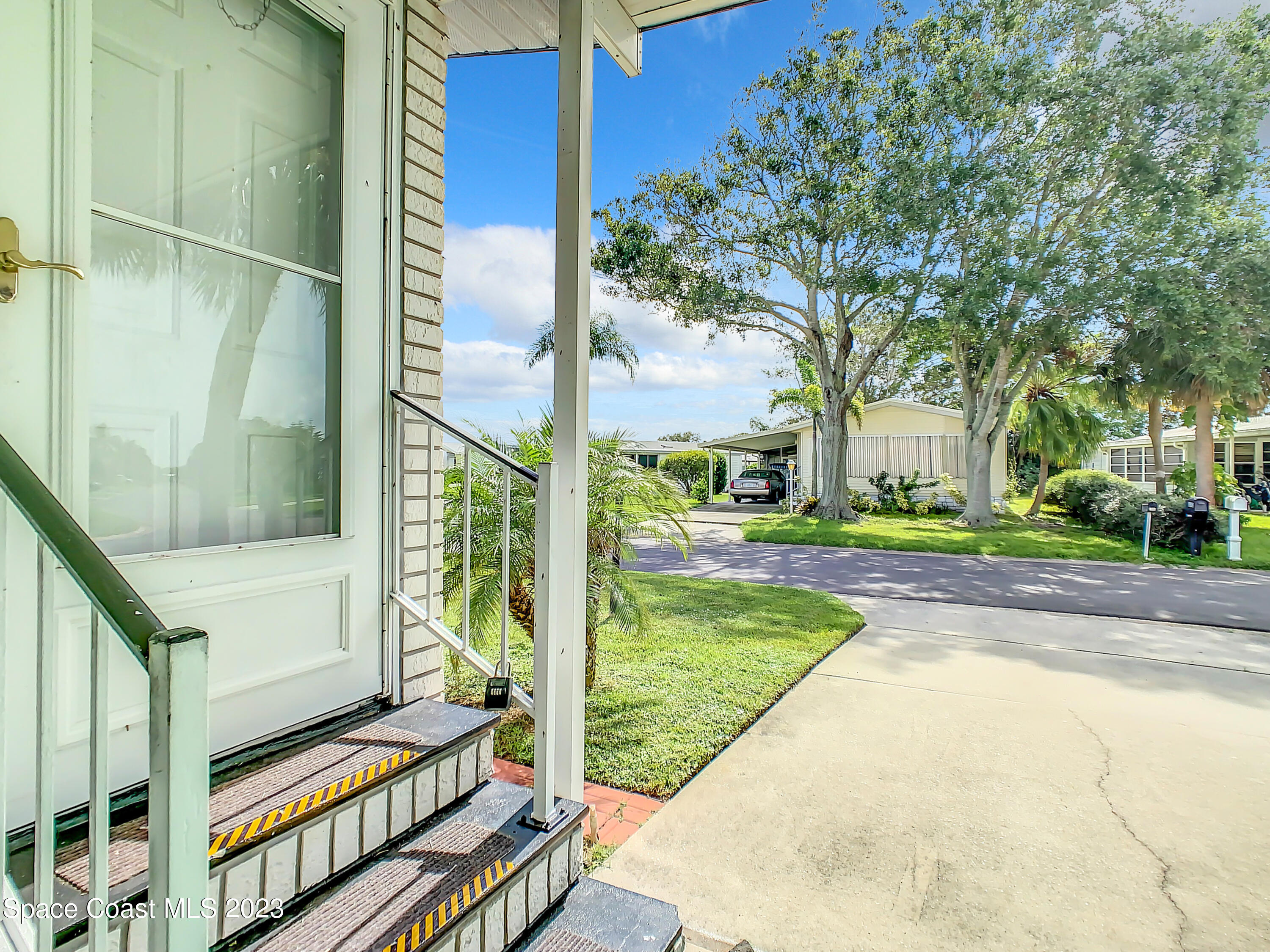 832 Periwinkle Circle Sebastian, FL 32976 - Photo 4 of 52 a view of backyard with green space