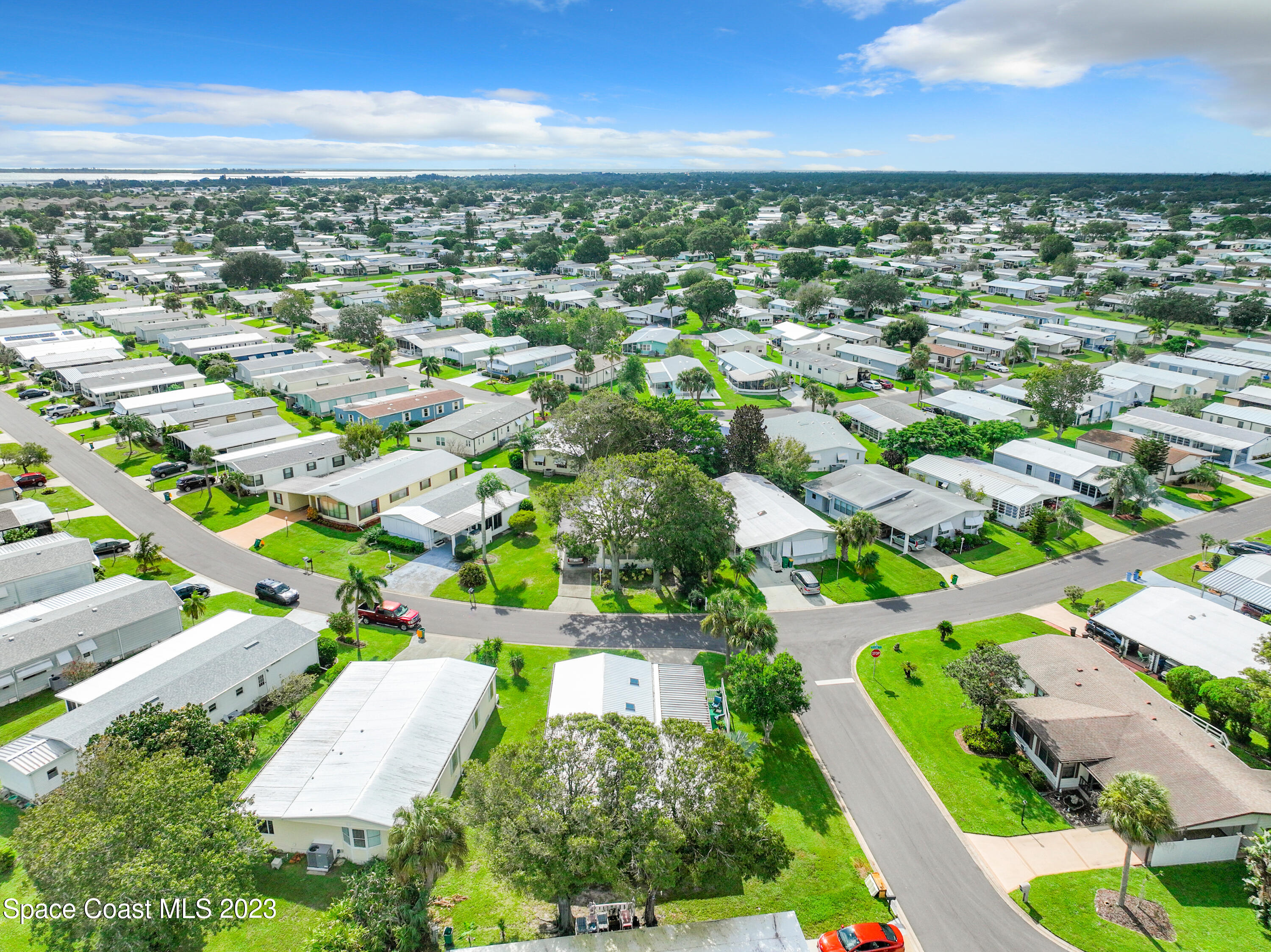 832 Periwinkle Circle Sebastian, FL 32976 - Photo 48 of 52 an aerial view of residential houses with outdoor space