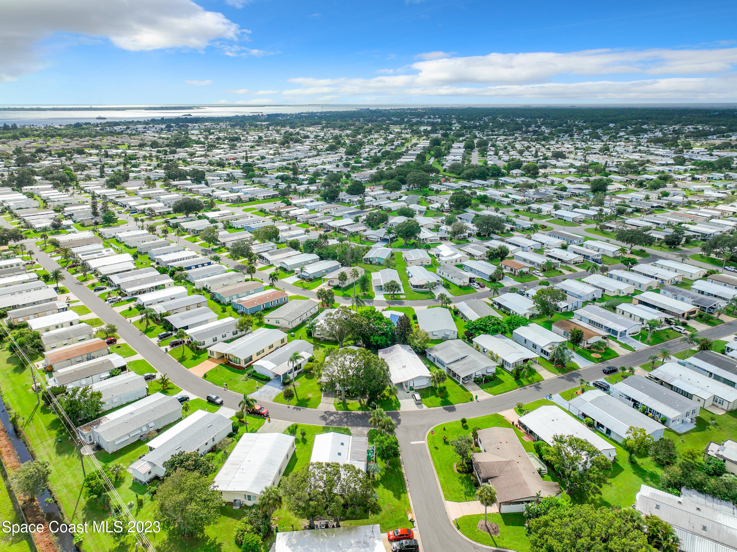 832 Periwinkle Circle Sebastian, FL 32976 - Photo 51 of 52 an aerial view of residential houses with outdoor space