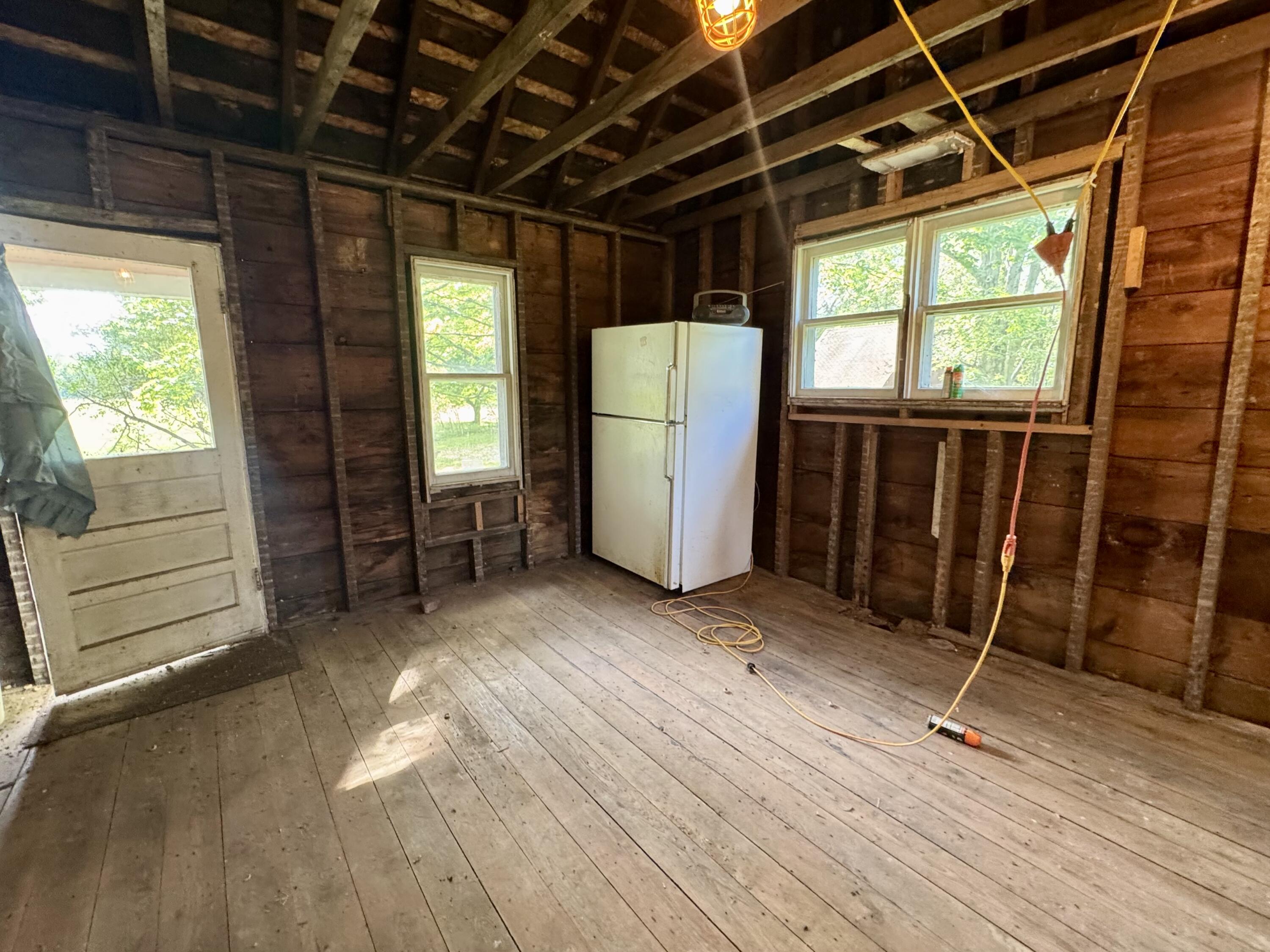 1038 Meridian Road Chesterton, IN 46304 - Photo 11 of 25 a view of an empty room with a window