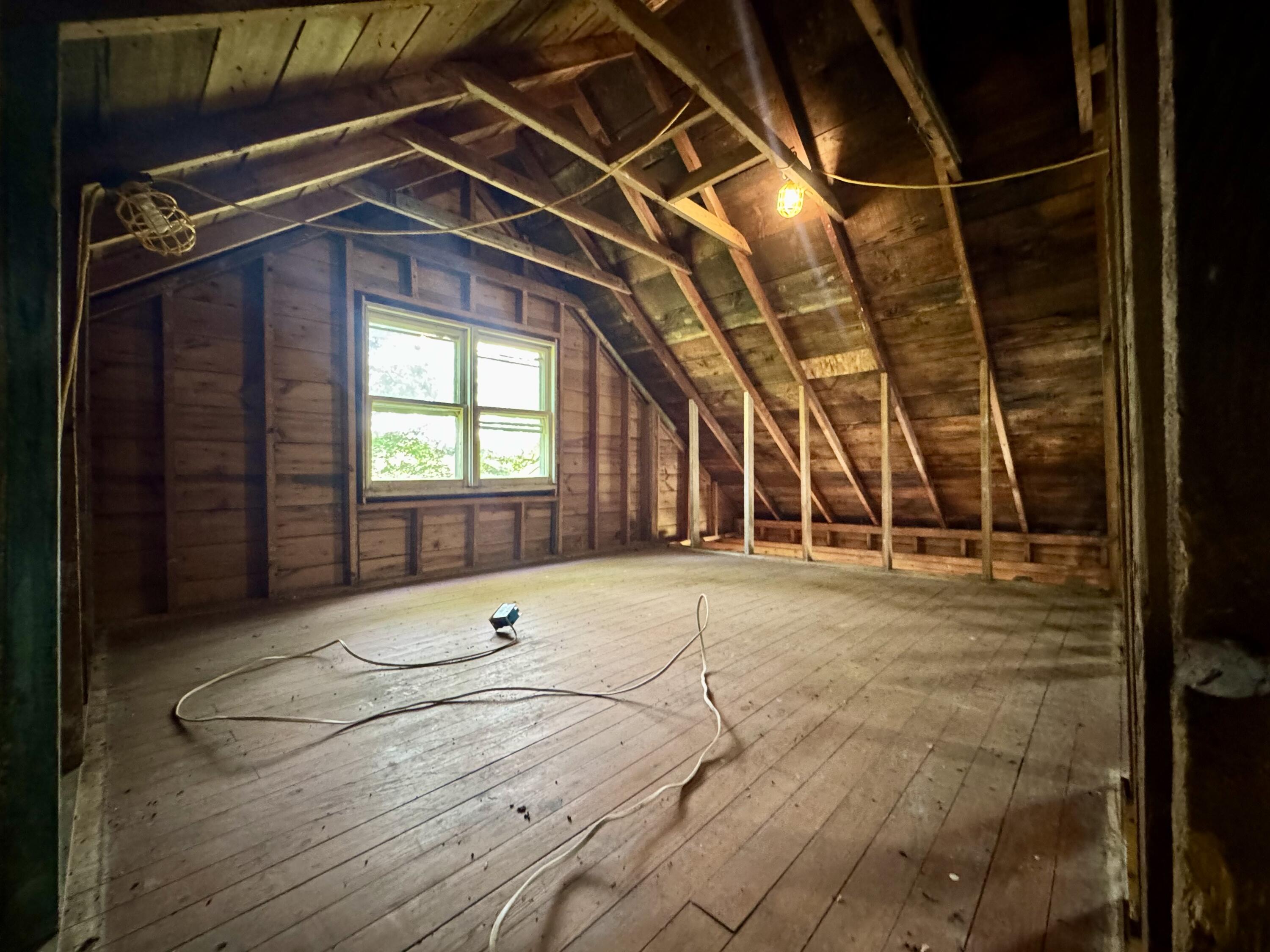 1038 Meridian Road Chesterton, IN 46304 - Photo 12 of 25 a room with wooden floor and white walls