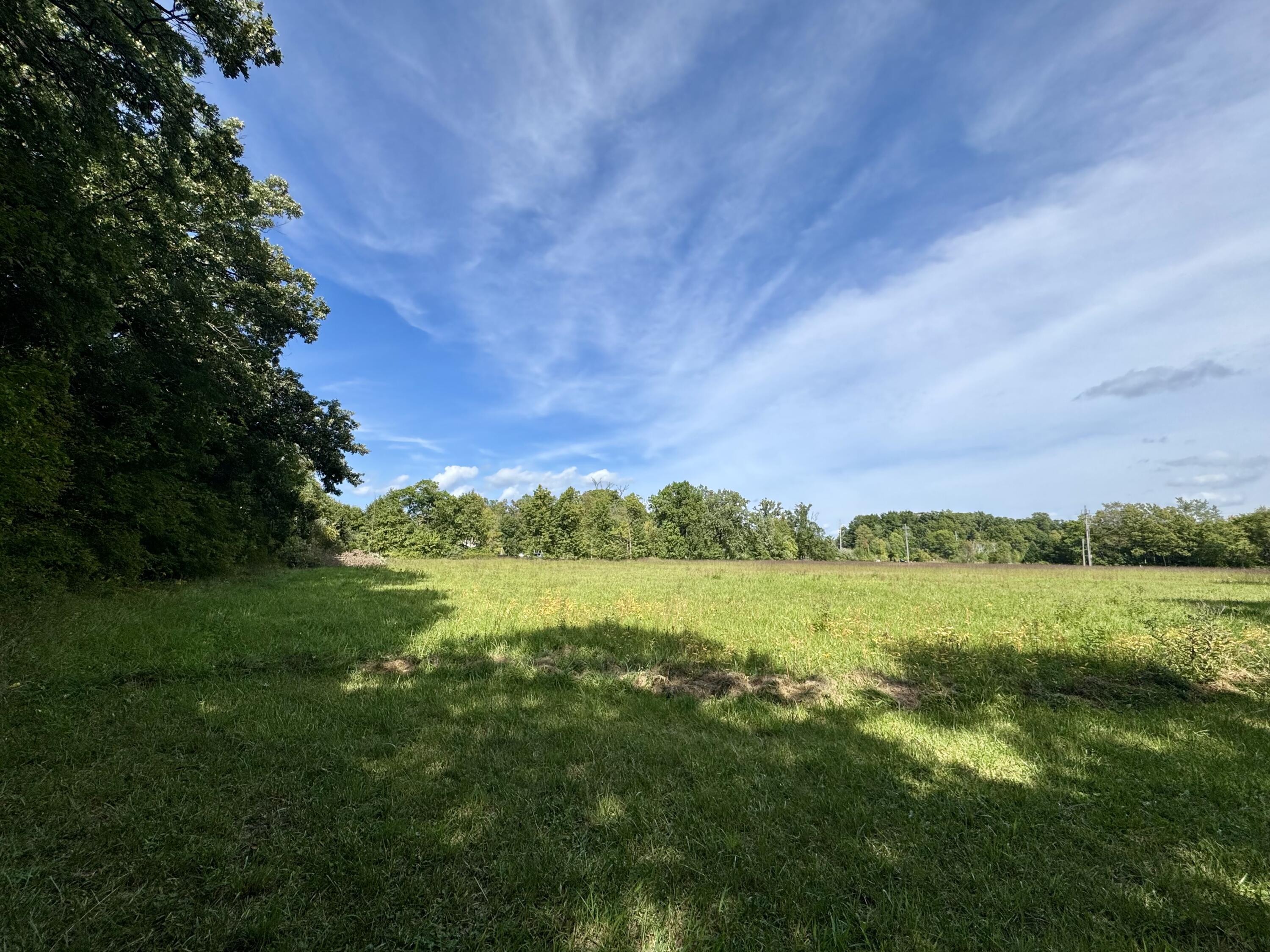 1038 Meridian Road Chesterton, IN 46304 - Photo 17 of 25 a view of an ocean and a mountain