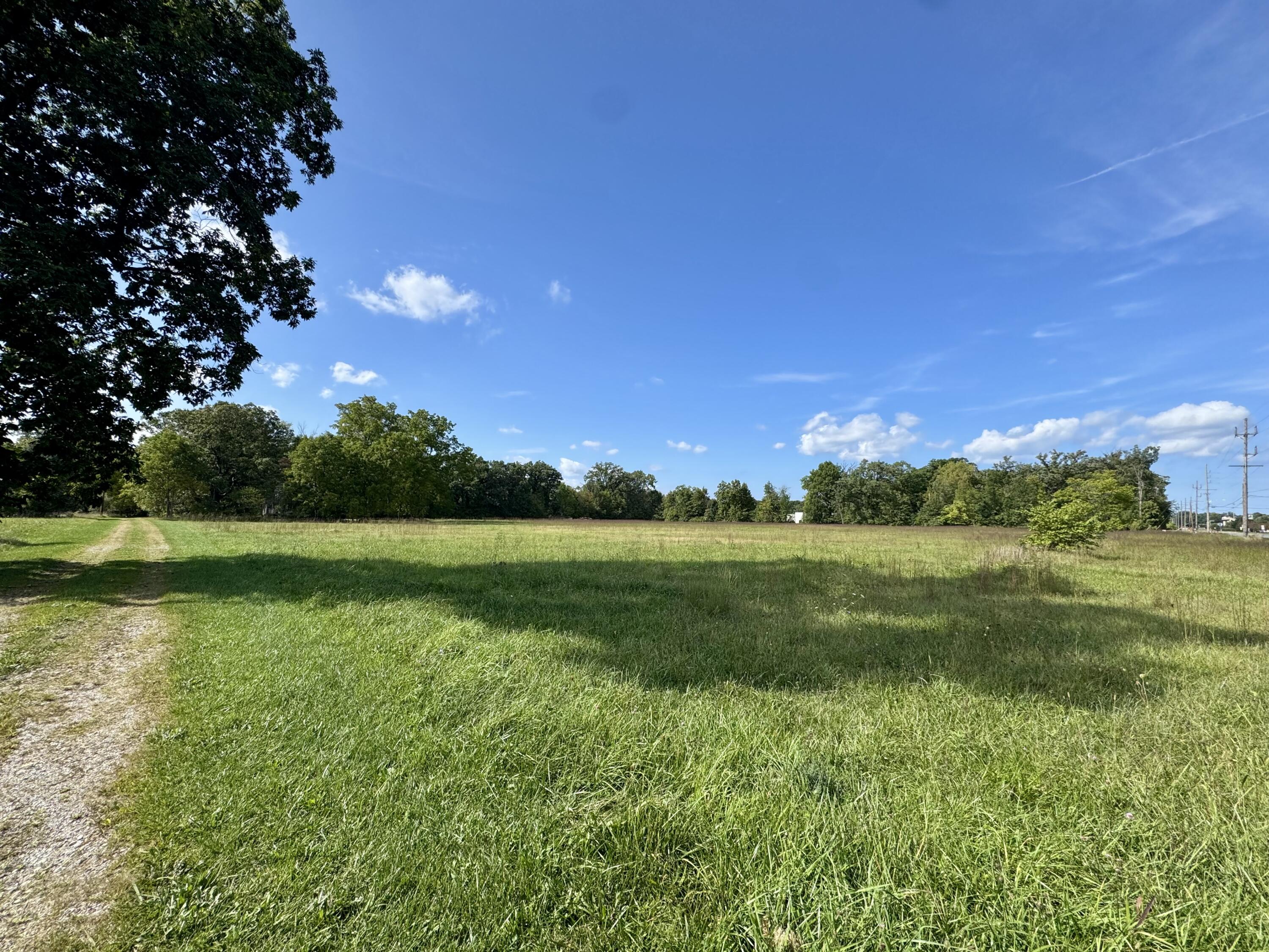1038 Meridian Road Chesterton, IN 46304 - Photo 19 of 25 a view of a golf course with a lake