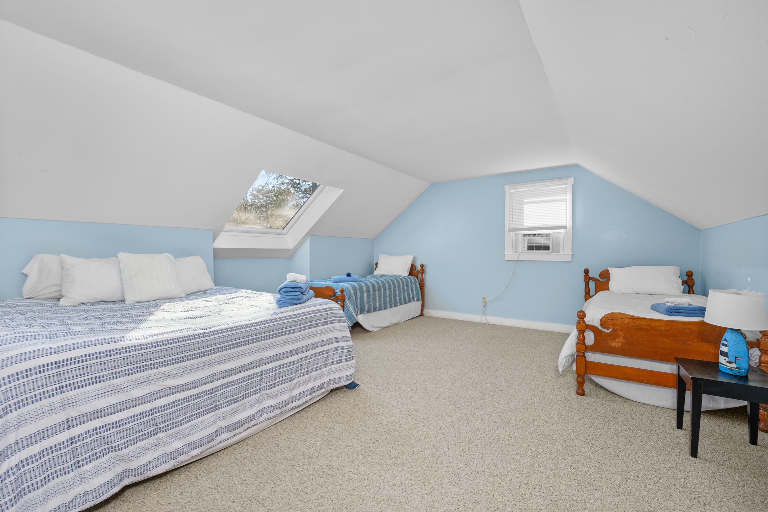 578 Huckins Neck Road Centerville, MA 02632 - Photo 25 of 42 a bedroom with bed and a window