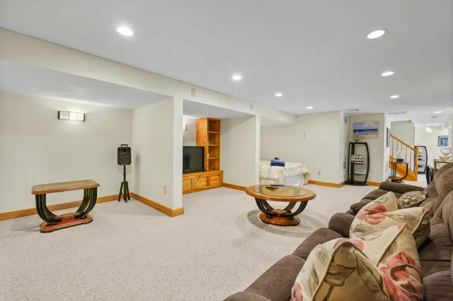 a room with furniture and gym equipment