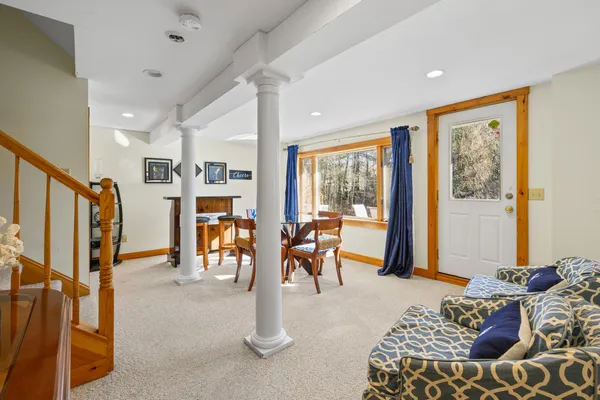 a bedroom with furniture and a window