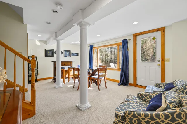 a bedroom with furniture and a window