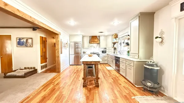 a view of a living room with a bed