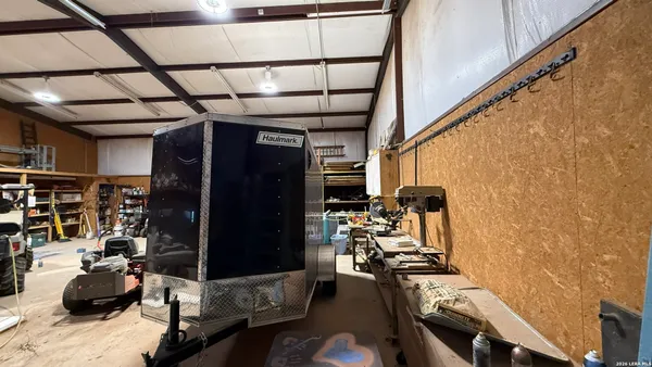 a room with gym equipment and a window