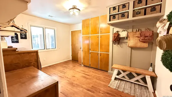 a view of a livingroom with furniture and windows