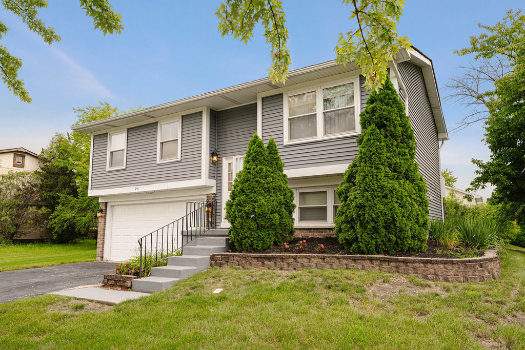 241 Huntingwood Road Matteson, IL 60443 - Photo 1 of 18 front view of a house with a yard