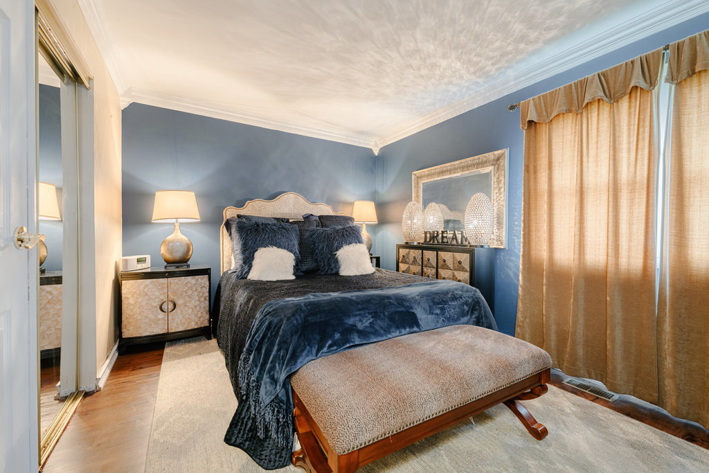 241 Huntingwood Road Matteson, IL 60443 - Photo 12 of 18 a bed room with a bed and a window