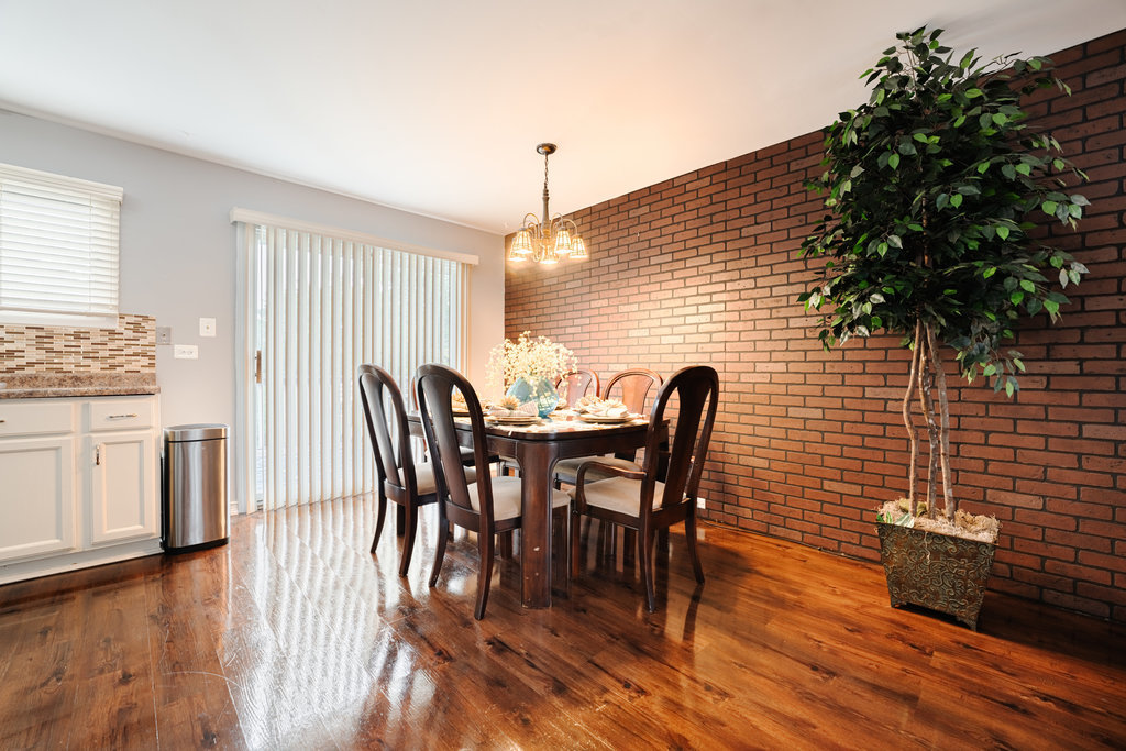 241 Huntingwood Road Matteson, IL 60443 - Photo 6 of 18 a dining room with furniture and wooden floor