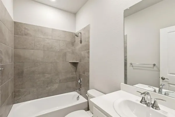 a bathroom with a sink and a bathtub