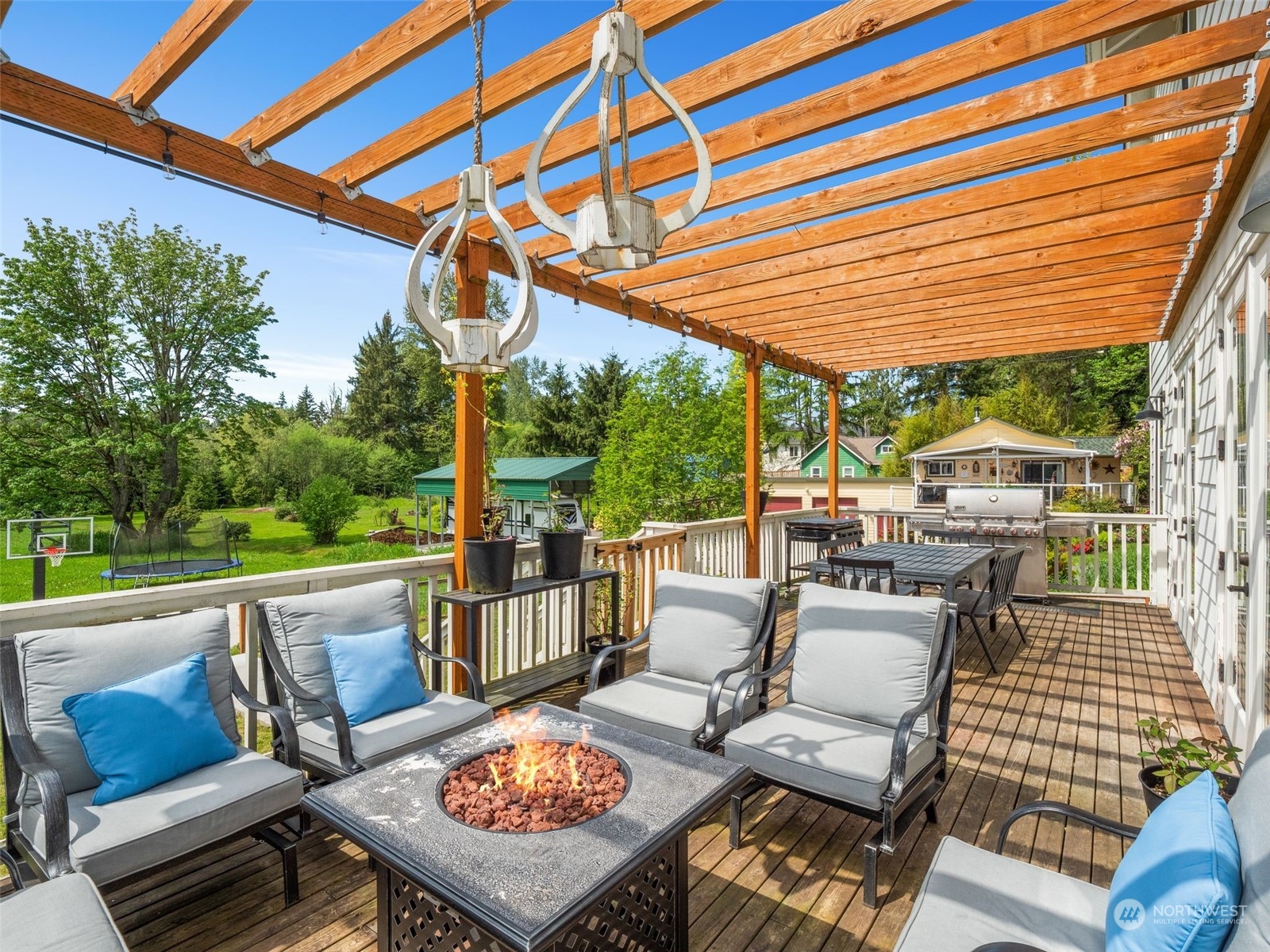 2440 Callow Road Lake Stevens, WA 98258 - Photo 12 of 34 a view of a patio with couches chairs and a table