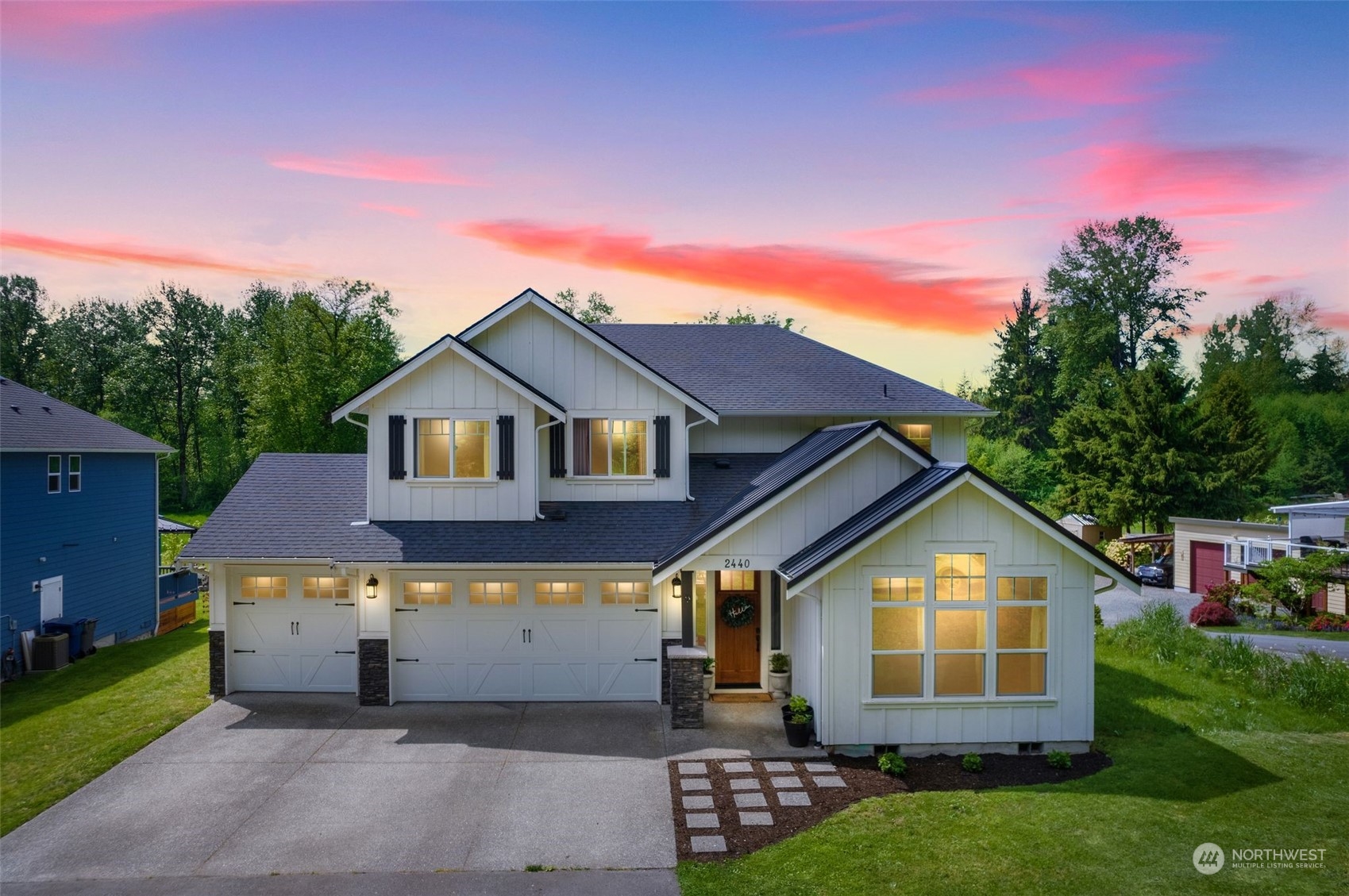 2440 Callow Road Lake Stevens, WA 98258 - Photo 2 of 34 a front view of a house with a yard