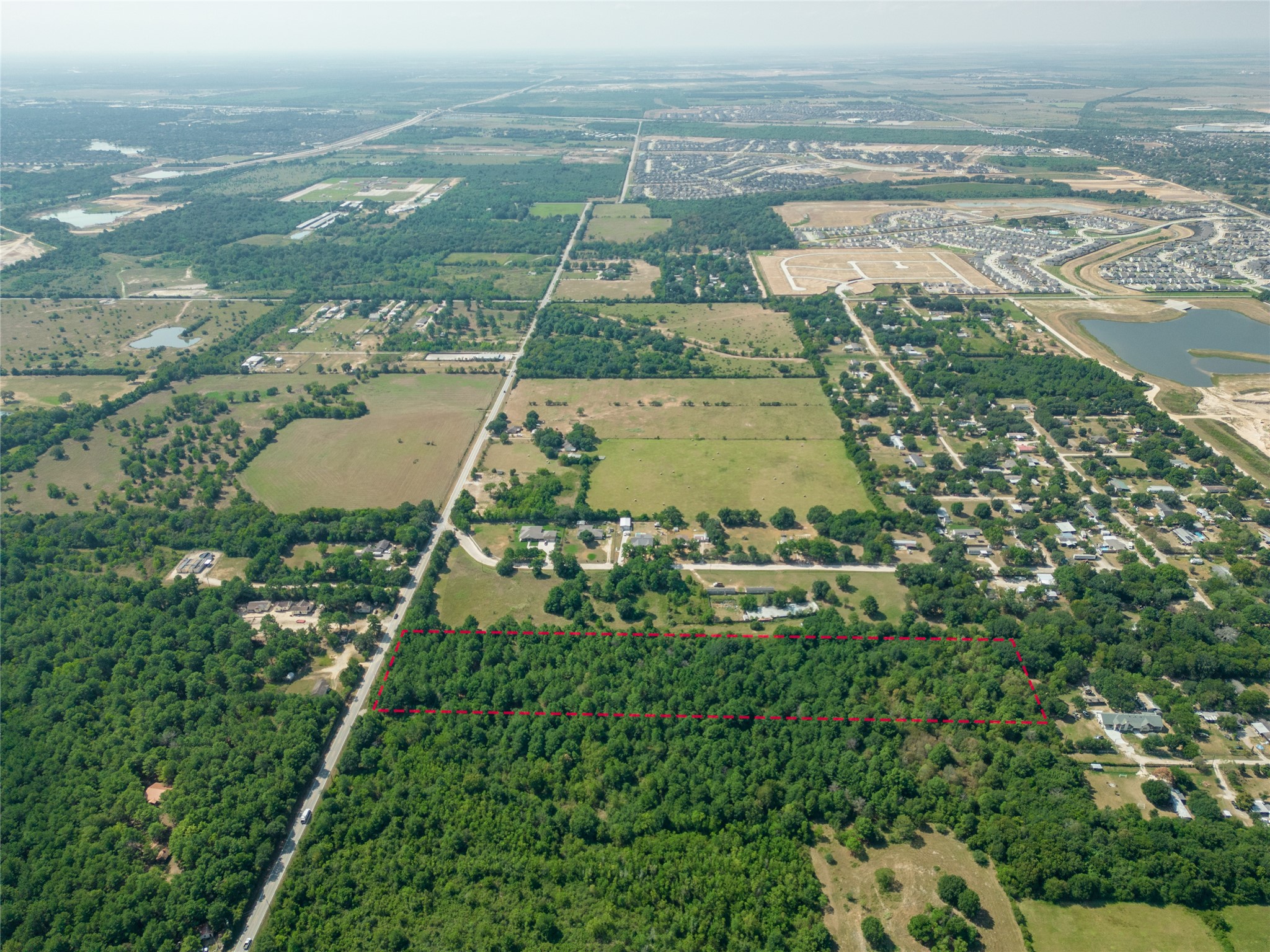 0 Bauer Road Hockley, TX 77447 - Photo 12 of 18 an aerial view of residential houses with outdoor space