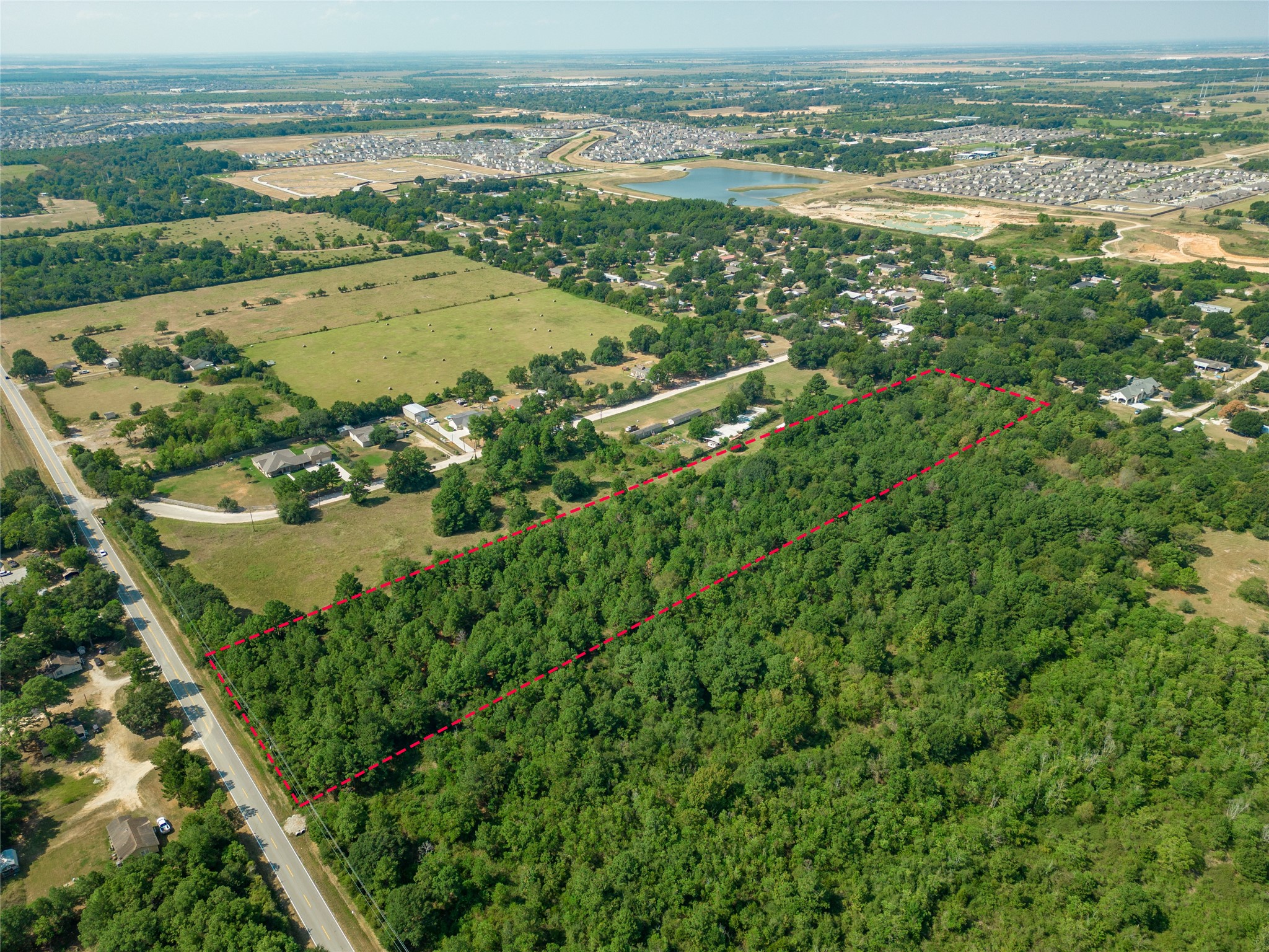0 Bauer Road Hockley, TX 77447 - Photo 4 of 18 a view of a lake with a beach