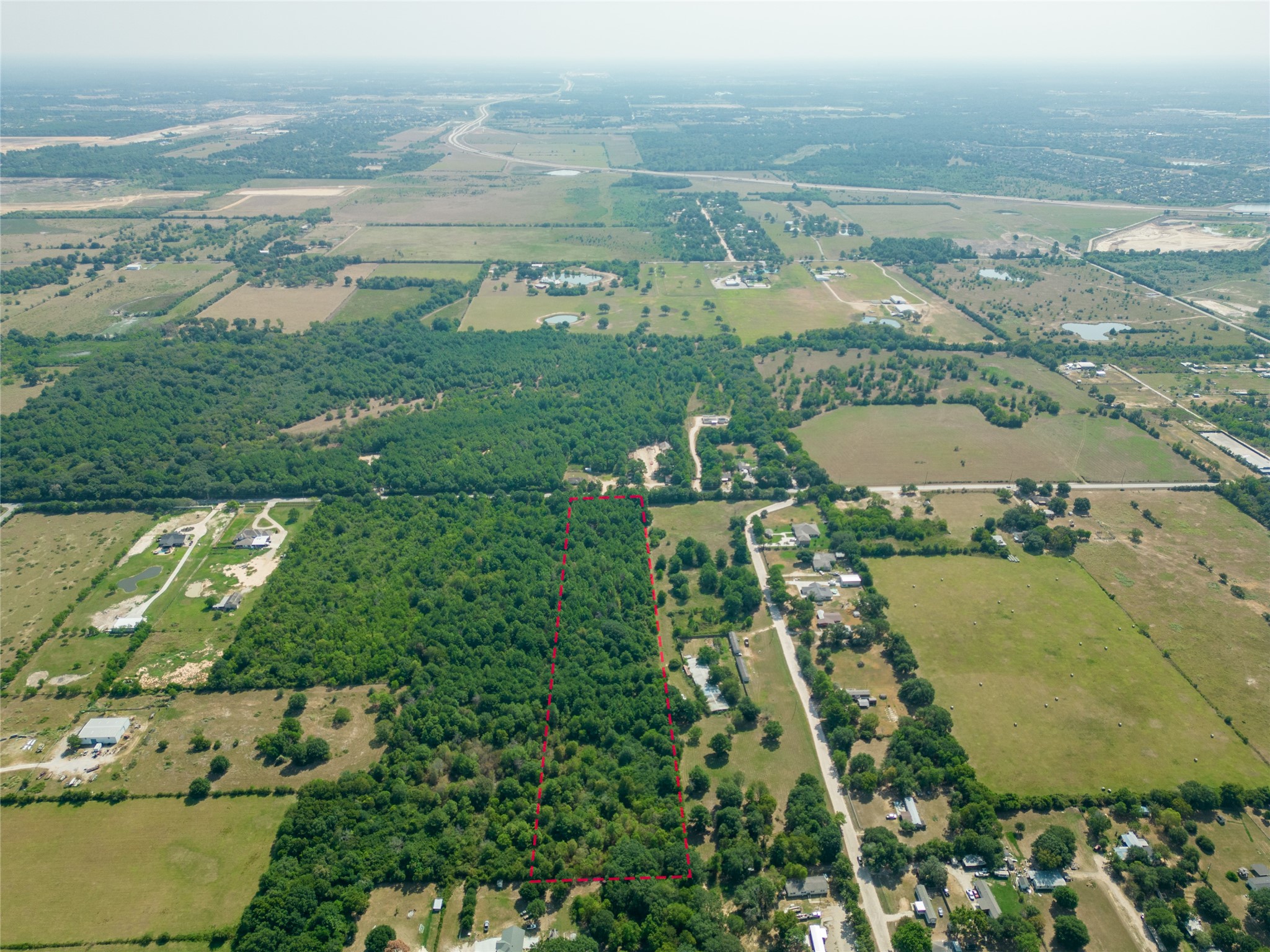 0 Bauer Road Hockley, TX 77447 - Photo 10 of 18 an aerial view of residential houses with outdoor space