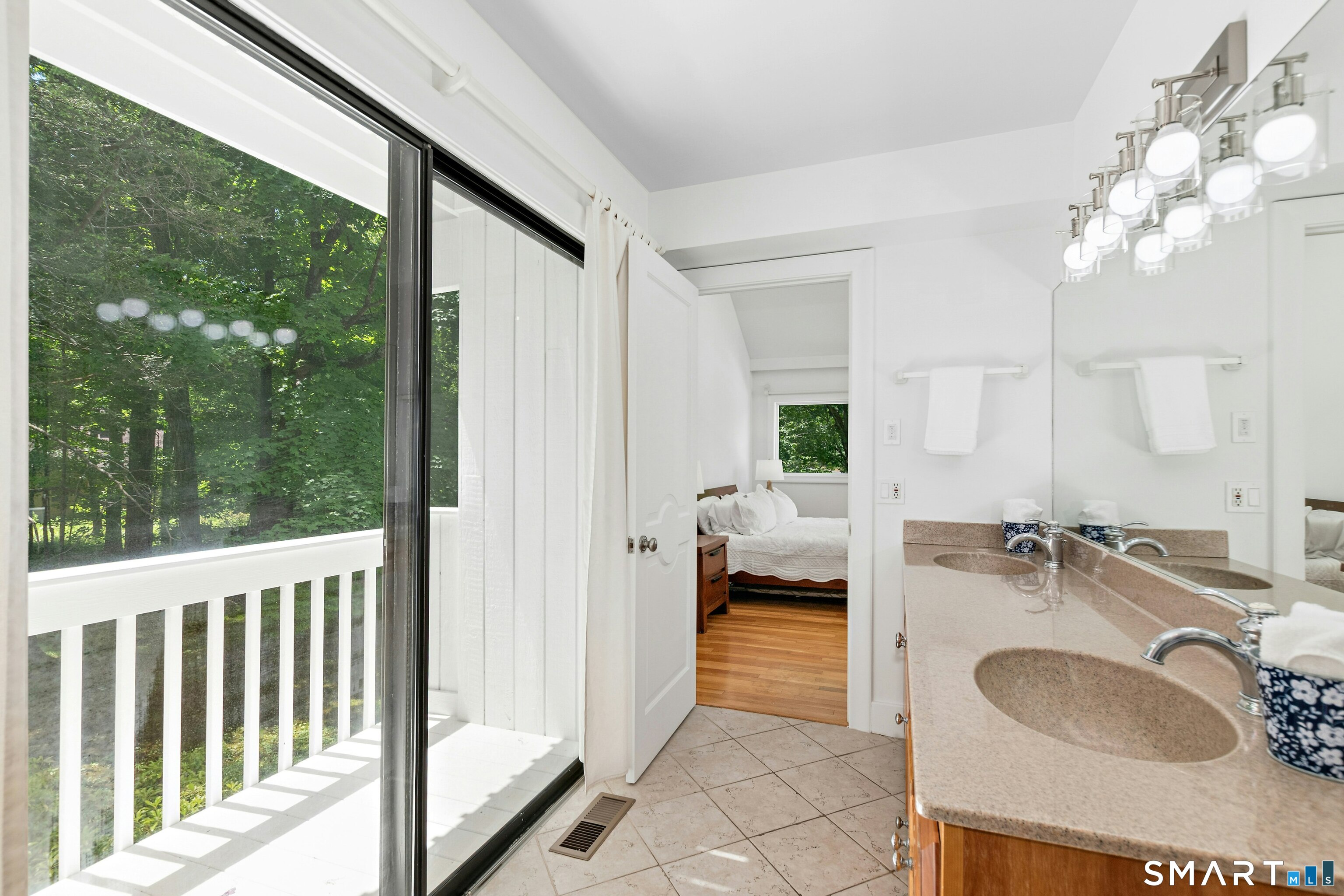 38 Old Redding Road Weston, CT 06883 - Photo 18 of 40 This home truly takes full advantage of its lovely exterior and is loaded with sunlight.