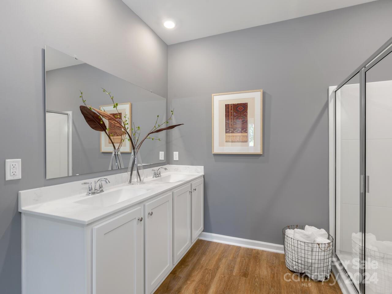 1965 Vanderlyn Street Monroe, NC 28112 - Photo 16 of 16 a bathroom with a sink and a mirror