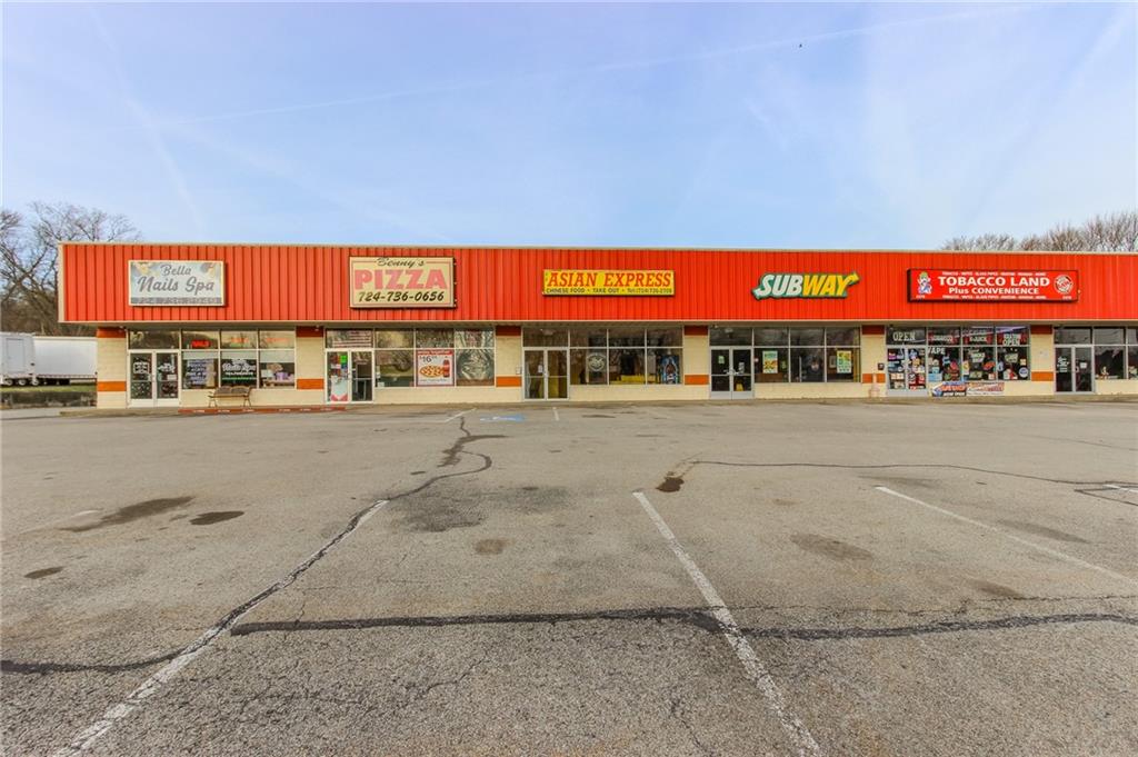 3379 Pittsburgh Street, Unit 109 Perryopolis, PA 15473 - Photo 43 of 47 a view of a parking area