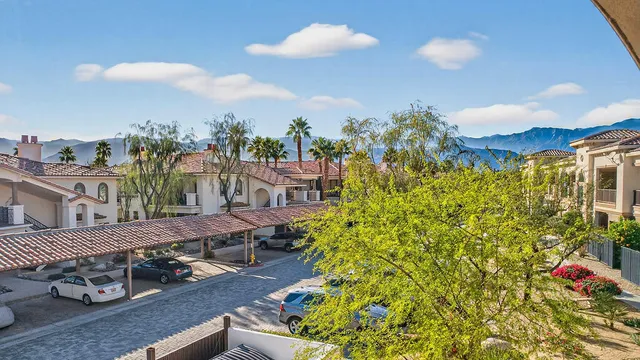 a bed room with a bed and a chandelier