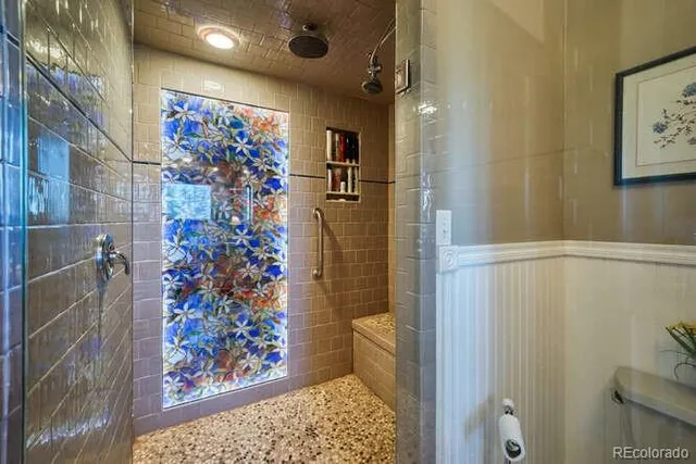 a bedroom with a bed and a view of bedroom