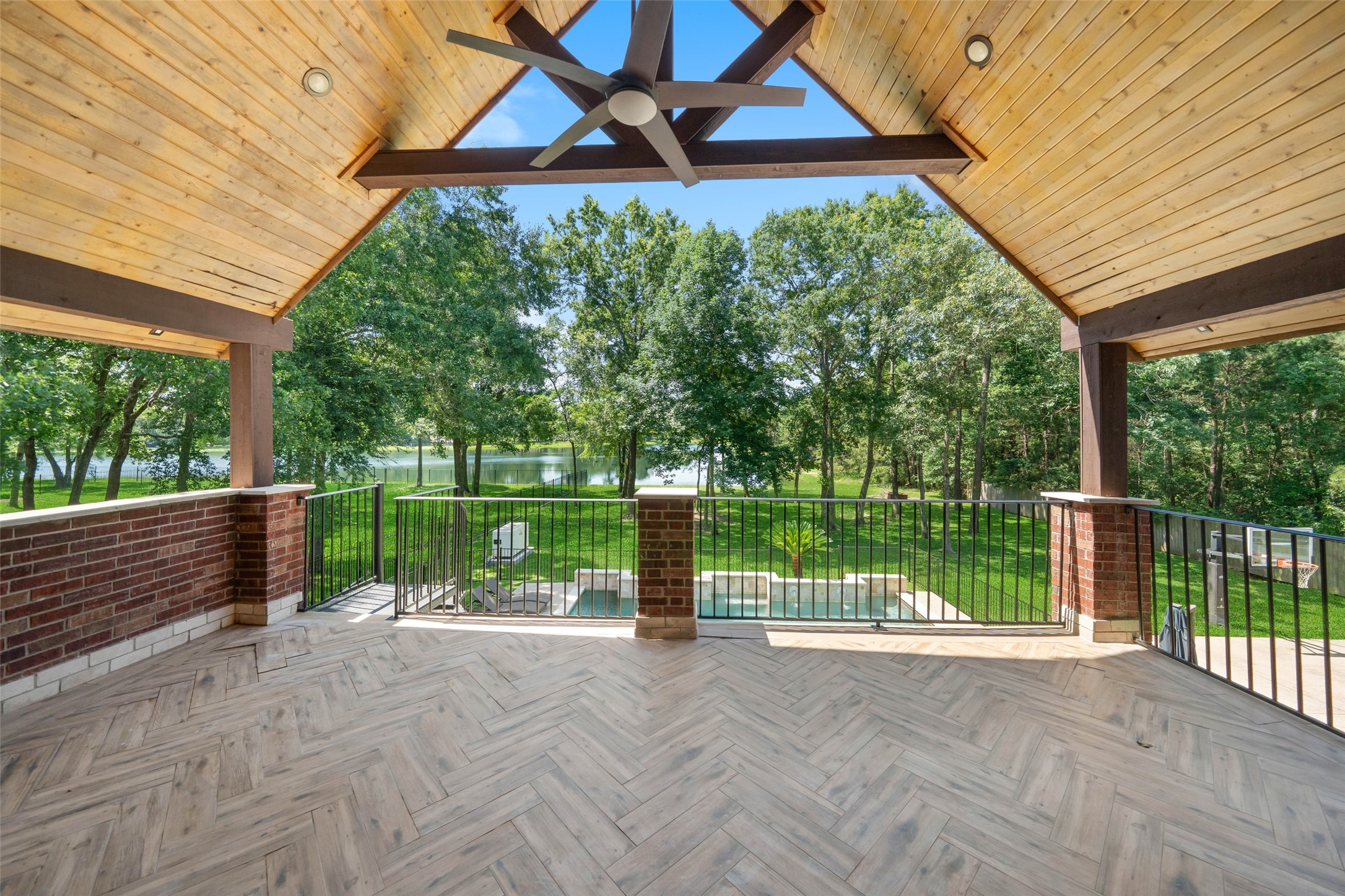 2302 Legends Shore Drive Spring, TX 77386 - Photo 3 of 49 Covered balcony retreat offering peaceful views of the backyard and lake.