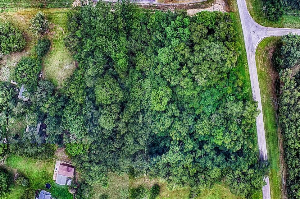 Southeast 9th Avenue Starke, FL 32091 - Photo 14 of 21 an aerial view of residential house with outdoor space and trees all around