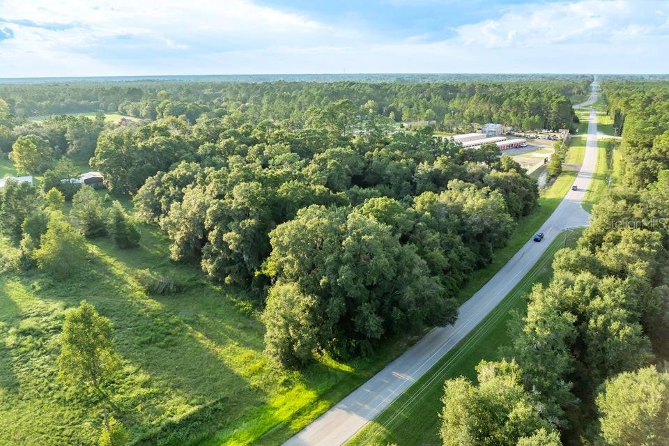 Southeast 9th Avenue Starke, FL 32091 - Photo 18 of 21 an aerial view of residential houses with outdoor space and trees