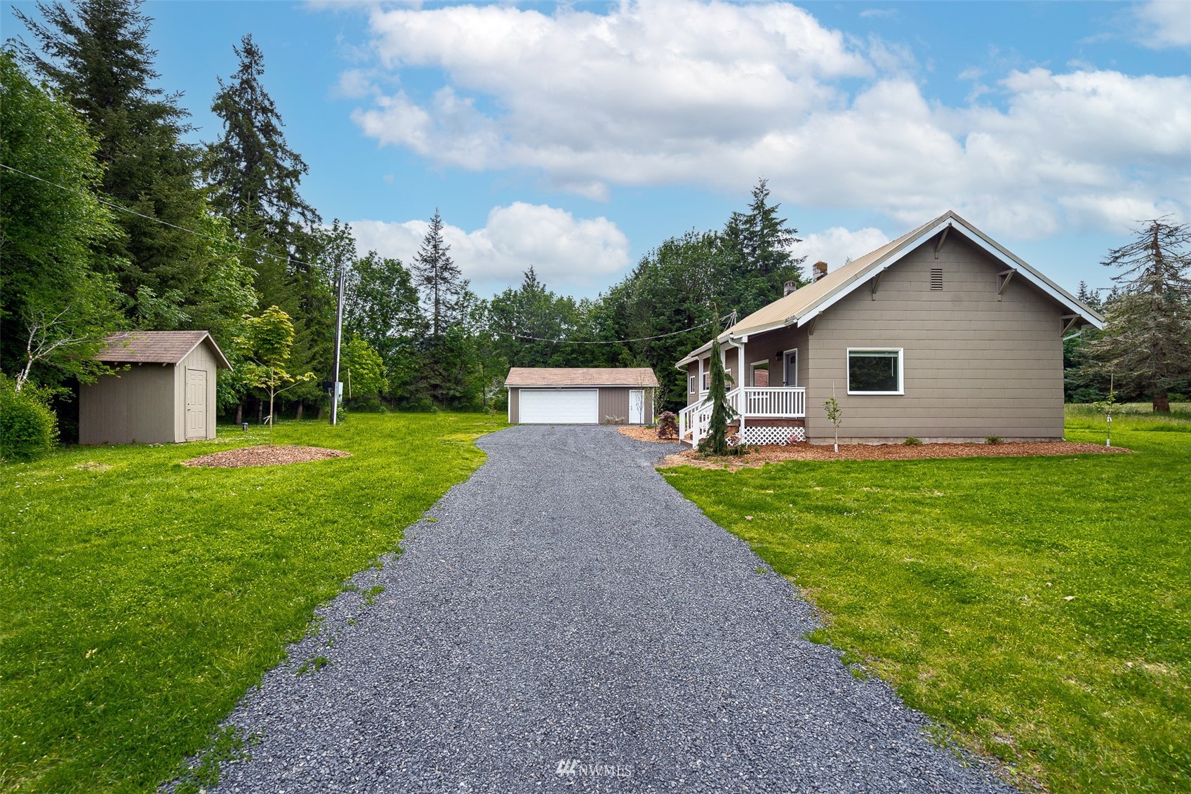 517 Leudinghaus Road Chehalis, WA 98532 - Photo 2 of 37 a view of a house with yard and a garden