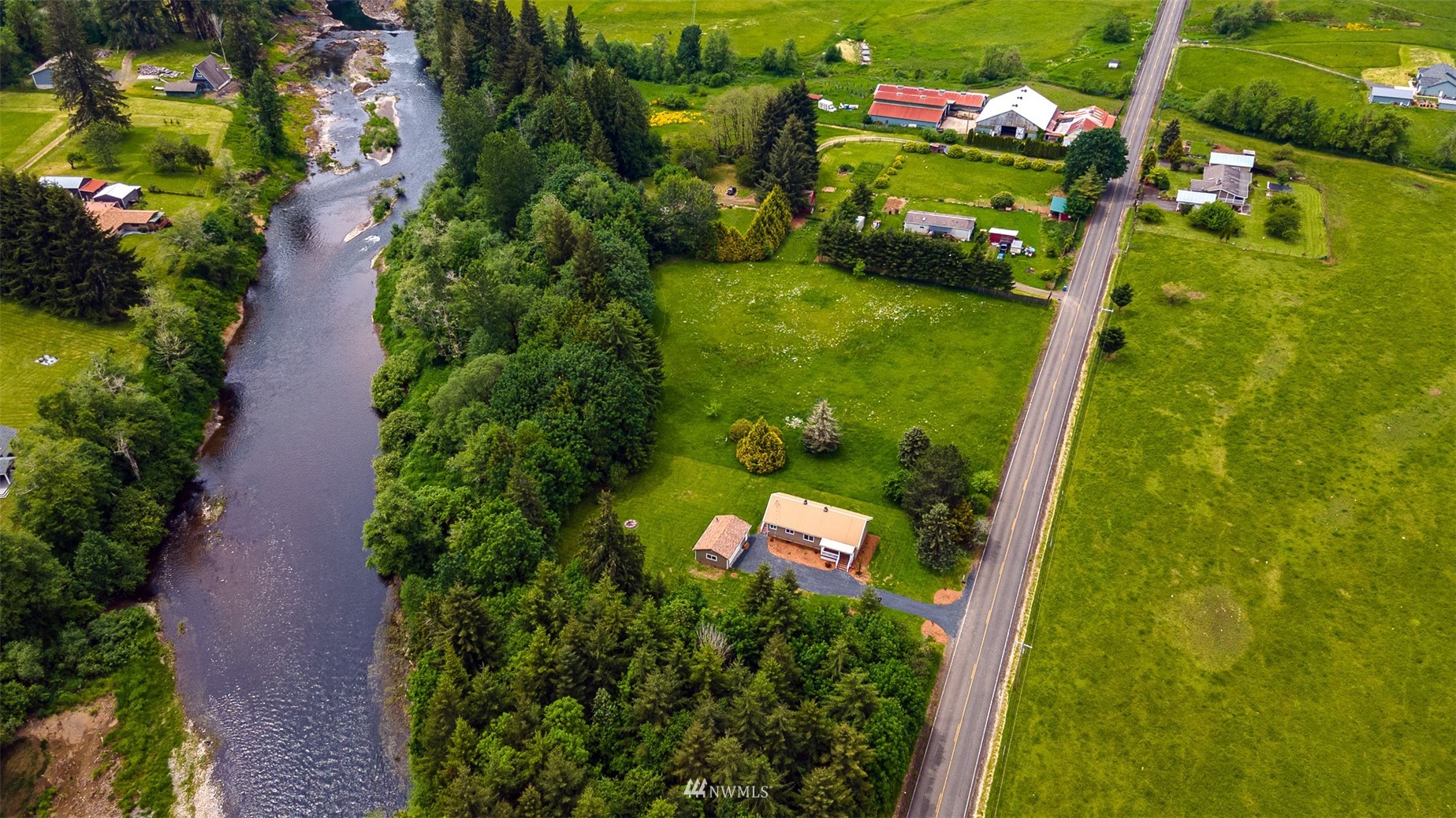 517 Leudinghaus Road Chehalis, WA 98532 - Photo 36 of 37 an aerial view of residential houses with outdoor space and trees