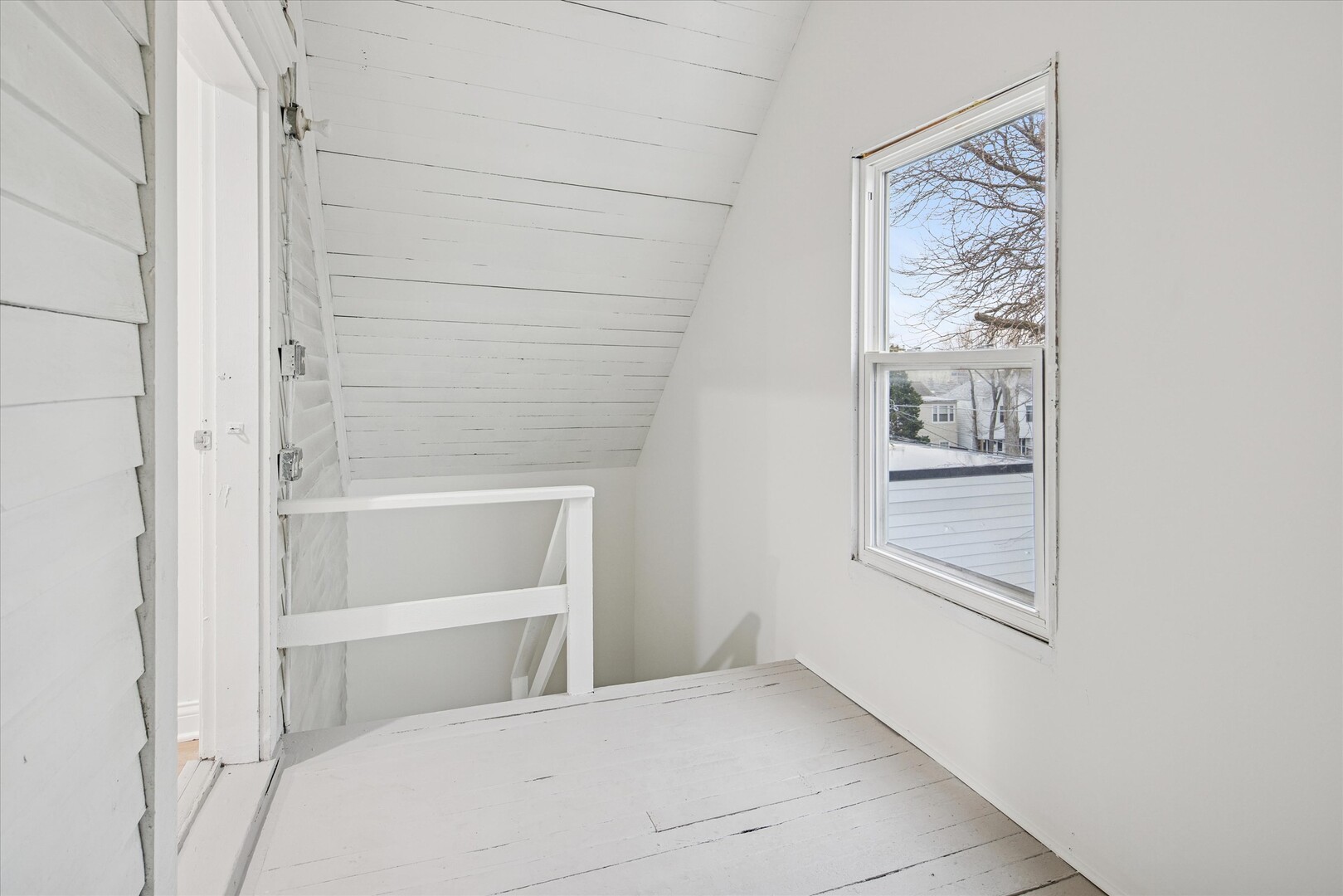 3818 North Hermitage Avenue, Unit 2 Chicago, IL 60613 - Photo 14 of 16 a bedroom with a bed and a window