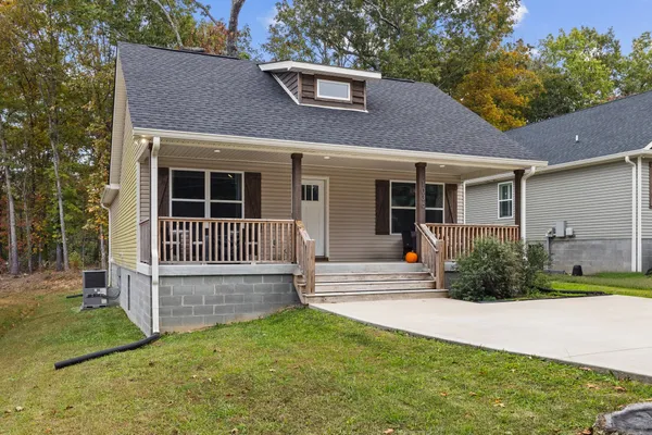a house view with a garden space