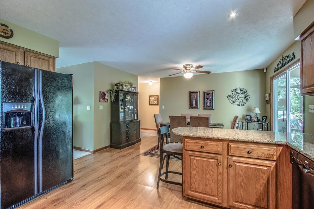 1397 Back Bone Road Sparta, TN 38583 - Photo 16 of 30 a kitchen with a table and refrigerator