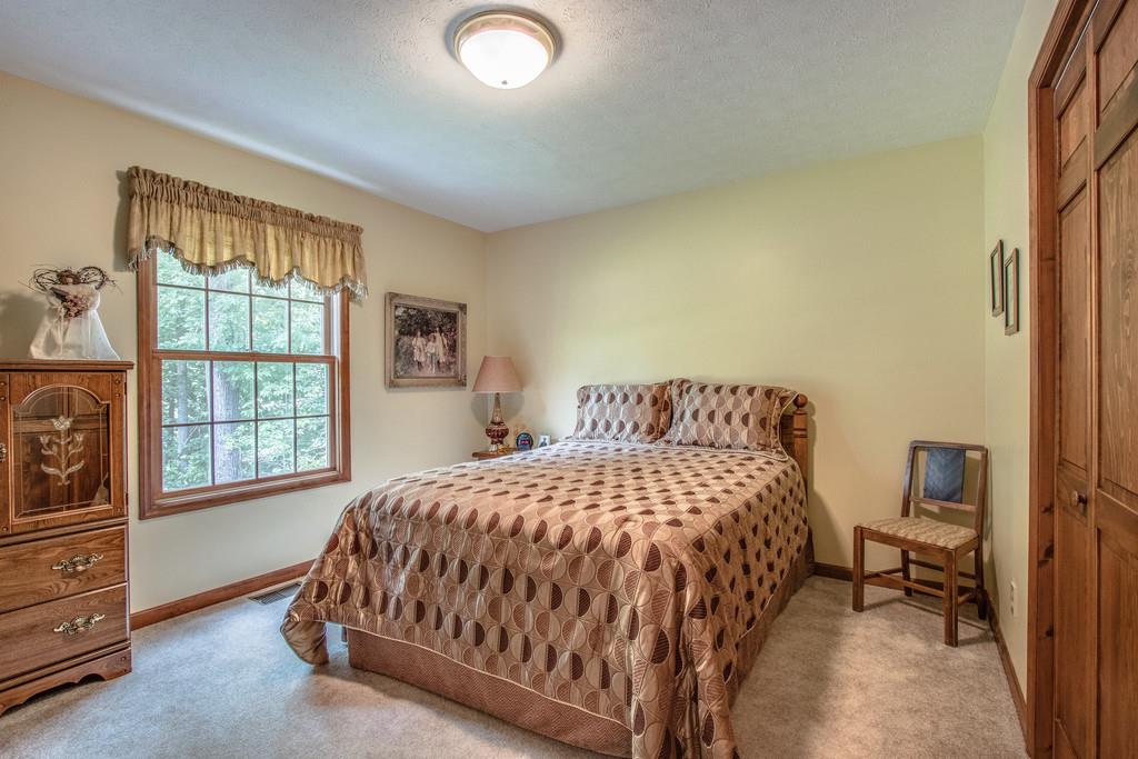 1397 Back Bone Road Sparta, TN 38583 - Photo 22 of 30 a bedroom with a bed chair and a window