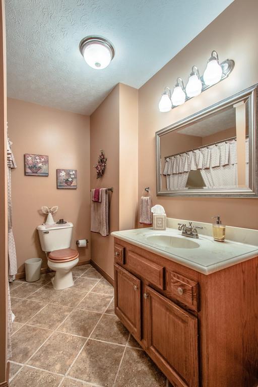 1397 Back Bone Road Sparta, TN 38583 - Photo 24 of 30 a bathroom with a sink and a mirror