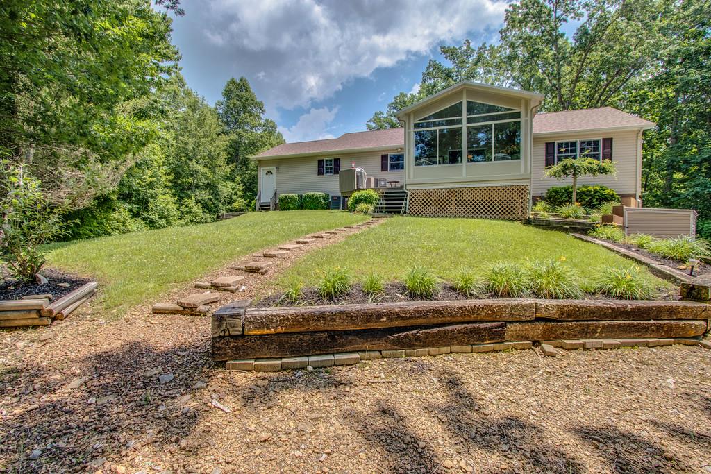 1397 Back Bone Road Sparta, TN 38583 - Photo 30 of 30 a front view of a house with a yard