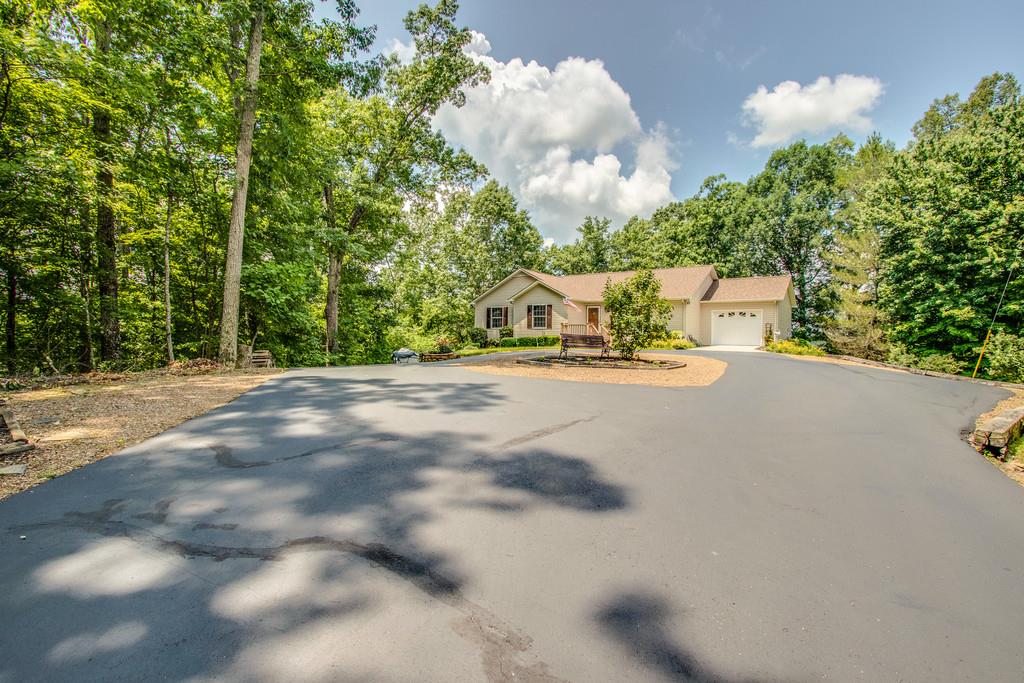 1397 Back Bone Road Sparta, TN 38583 - Photo 3 of 30 a view of the road with a building in the background