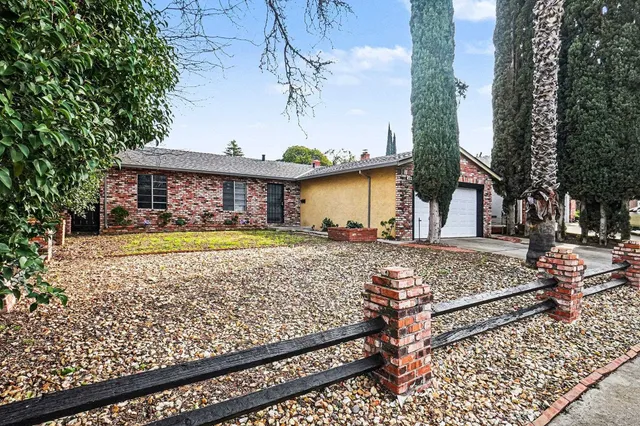 a view of a house with garden