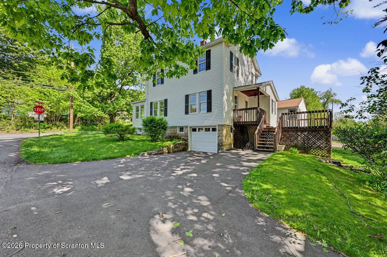 502 Layton Road Clarks Summit, PA 18411 - Photo 41 of 42 a pathway of a house with a yard