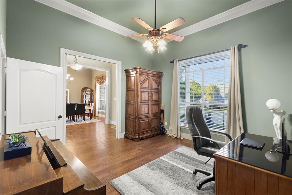 105 Country Ridge Court Red Oak, TX 75154 - Photo 8 of 40 a dining room with furniture and a floor to ceiling window