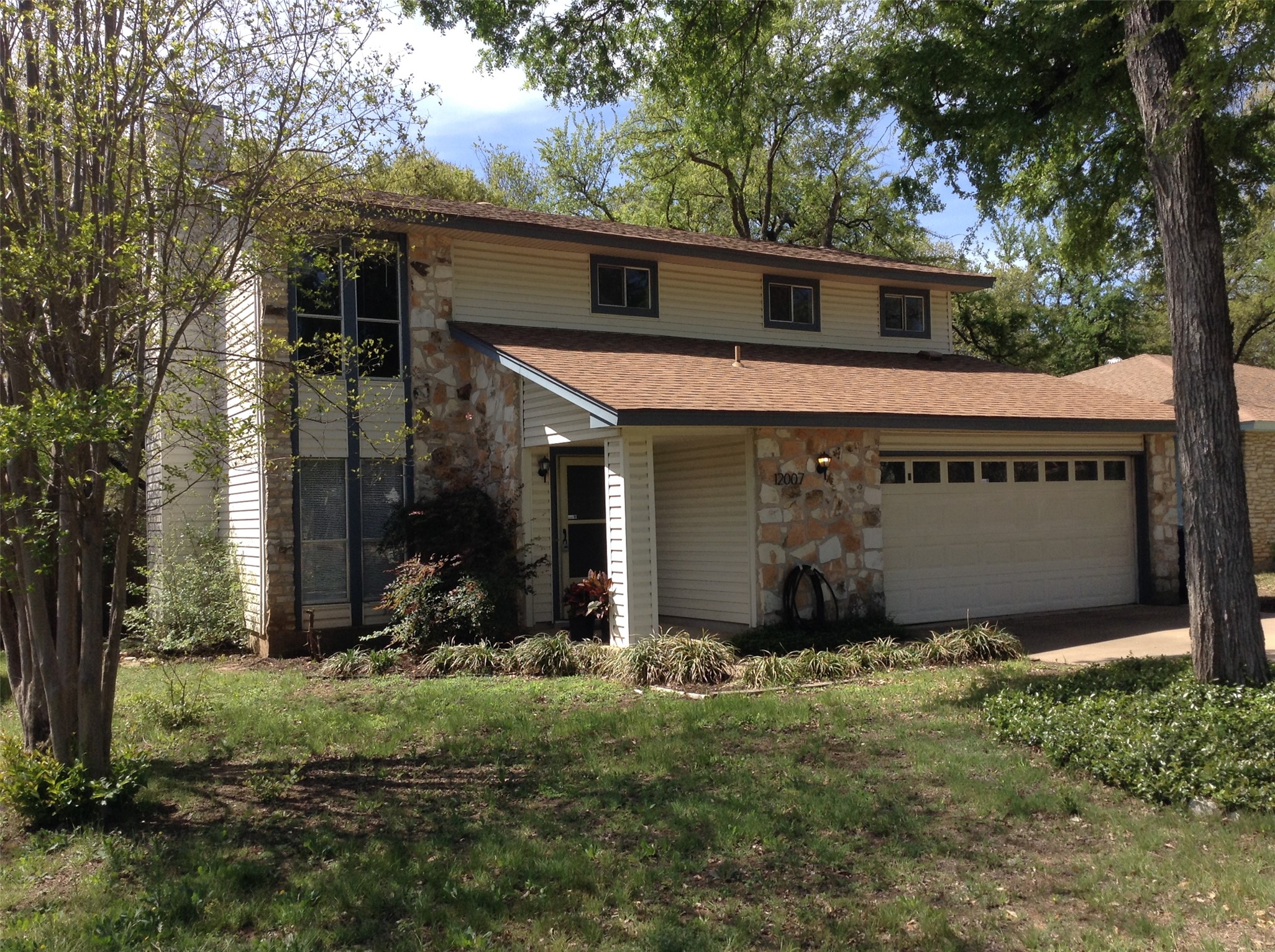 12007 Scribe Drive Austin, TX 78759 - Photo 1 of 35 a view of a house with backyard and garden